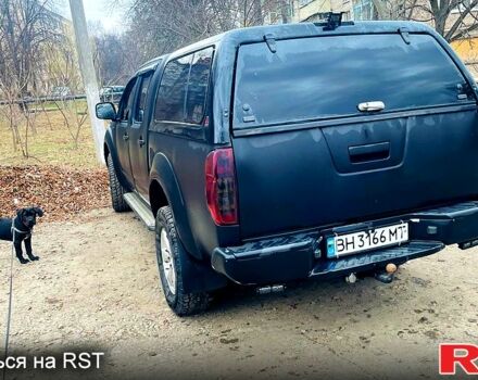 Черный Ниссан Навара, объемом двигателя 2.5 л и пробегом 370 тыс. км за 8000 $, фото 2 на Automoto.ua