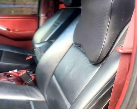 Черный Ниссан Навара, объемом двигателя 2.5 л и пробегом 370 тыс. км за 8000 $, фото 5 на Automoto.ua