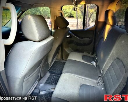 Черный Ниссан Навара, объемом двигателя 2.5 л и пробегом 280 тыс. км за 14999 $, фото 8 на Automoto.ua