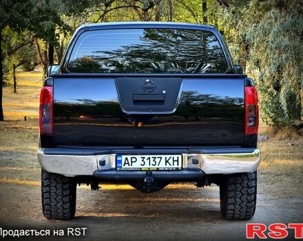 Черный Ниссан Навара, объемом двигателя 2.5 л и пробегом 280 тыс. км за 14999 $, фото 4 на Automoto.ua