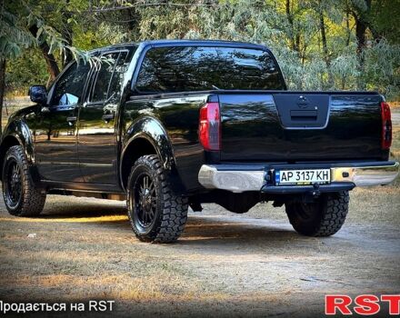 Черный Ниссан Навара, объемом двигателя 2.5 л и пробегом 280 тыс. км за 14999 $, фото 3 на Automoto.ua