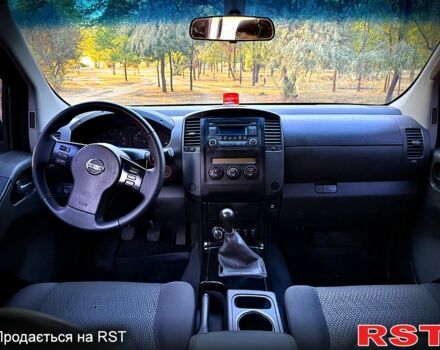 Черный Ниссан Навара, объемом двигателя 2.5 л и пробегом 280 тыс. км за 14999 $, фото 6 на Automoto.ua