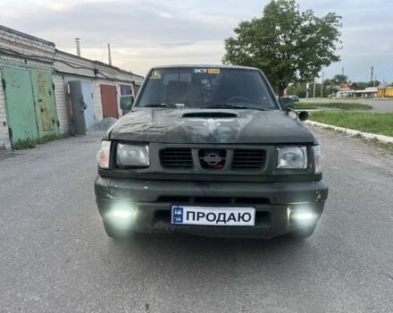 Черный Ниссан Навара, объемом двигателя 2.5 л и пробегом 238 тыс. км за 2999 $, фото 1 на Automoto.ua