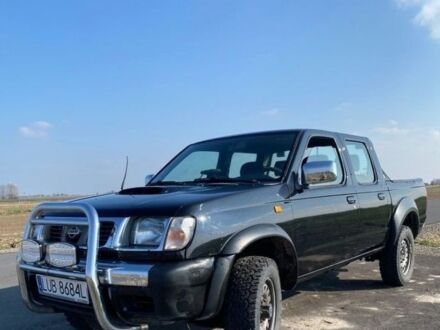 Чорний Ніссан Навара, об'ємом двигуна 2.5 л та пробігом 234 тис. км за 2680 $, фото 1 на Automoto.ua