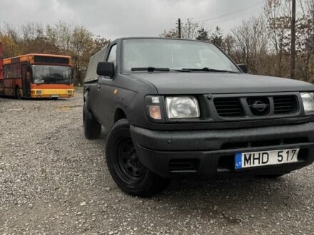 Черный Ниссан Навара, объемом двигателя 2.5 л и пробегом 1000 тыс. км за 3300 $, фото 1 на Automoto.ua