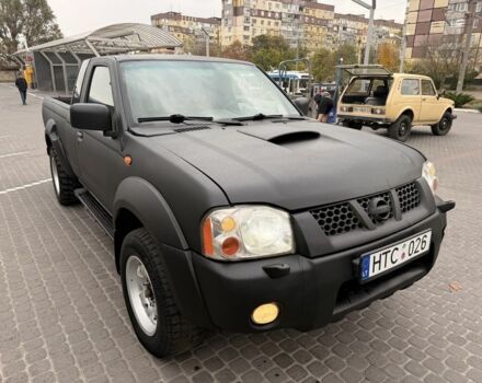 Черный Ниссан Навара, объемом двигателя 2.5 л и пробегом 200 тыс. км за 4750 $, фото 1 на Automoto.ua