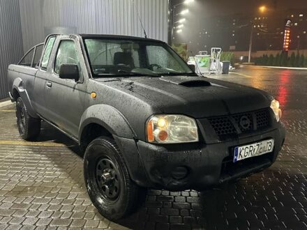 Черный Ниссан Навара, объемом двигателя 2.5 л и пробегом 180 тыс. км за 4500 $, фото 1 на Automoto.ua