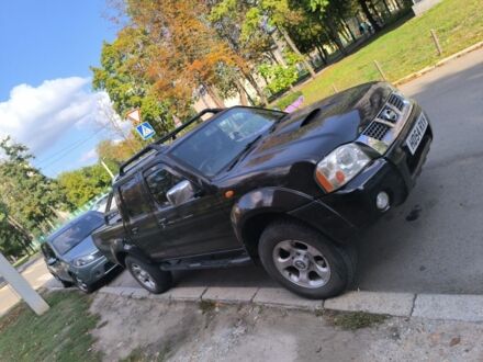 Черный Ниссан Навара, объемом двигателя 2.5 л и пробегом 140 тыс. км за 5013 $, фото 1 на Automoto.ua