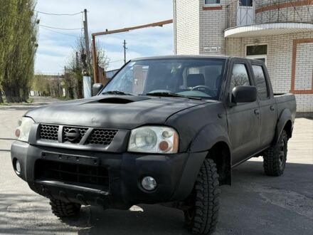 Ниссан Навара 2004 в Белой Церкве на Automoto.ua Черный Ниссан Навара, объемом двигателя 2.5 л и пробегом 200 тыс. км за 4400 $, фото 1 на Automoto.ua