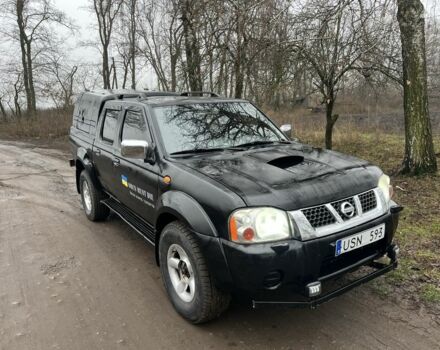 Черный Ниссан Навара, объемом двигателя 2.5 л и пробегом 213 тыс. км за 6000 $, фото 1 на Automoto.ua