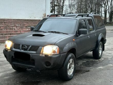 Черный Ниссан Навара, объемом двигателя 2.5 л и пробегом 200 тыс. км за 4650 $, фото 1 на Automoto.ua