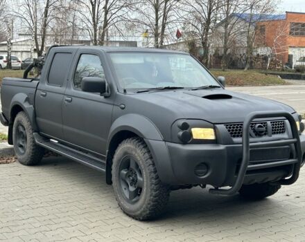 Черный Ниссан Навара, объемом двигателя 2.5 л и пробегом 220 тыс. км за 4250 $, фото 1 на Automoto.ua