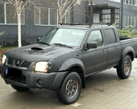 Черный Ниссан Навара, объемом двигателя 2.5 л и пробегом 200 тыс. км за 3450 $, фото 1 на Automoto.ua