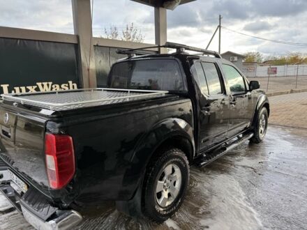 Черный Ниссан Навара, объемом двигателя 2.5 л и пробегом 325 тыс. км за 6000 $, фото 1 на Automoto.ua