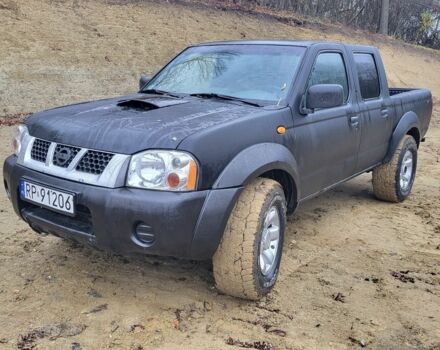 Черный Ниссан Навара, объемом двигателя 2.5 л и пробегом 256 тыс. км за 2800 $, фото 1 на Automoto.ua