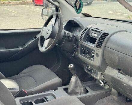 Черный Ниссан Навара, объемом двигателя 2.5 л и пробегом 390 тыс. км за 4161 $, фото 1 на Automoto.ua