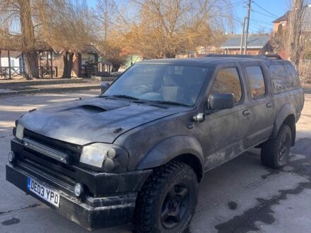 Черный Ниссан Навара, объемом двигателя 2.5 л и пробегом 250 тыс. км за 3800 $, фото 1 на Automoto.ua