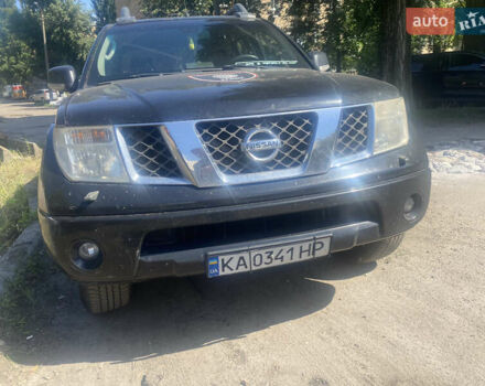 Черный Ниссан Навара, объемом двигателя 2.49 л и пробегом 400 тыс. км за 9000 $, фото 1 на Automoto.ua