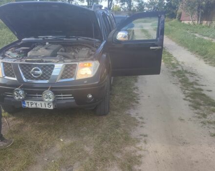 Черный Ниссан Навара, объемом двигателя 2.5 л и пробегом 402 тыс. км за 345000 $, фото 1 на Automoto.ua