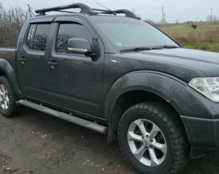 Черный Ниссан Навара, объемом двигателя 2.5 л и пробегом 240 тыс. км за 8600 $, фото 1 на Automoto.ua