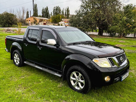 Черный Ниссан Навара, объемом двигателя 2.49 л и пробегом 109 тыс. км за 22000 $, фото 1 на Automoto.ua