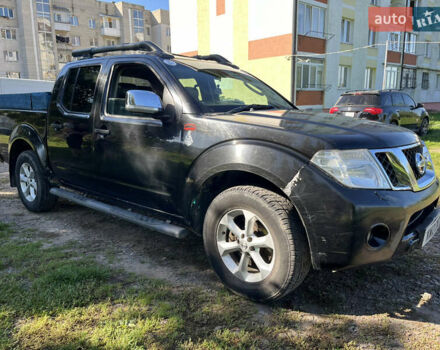 Черный Ниссан Навара, объемом двигателя 2.49 л и пробегом 280 тыс. км за 5328 $, фото 1 на Automoto.ua