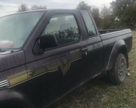 Коричневый Ниссан Навара, объемом двигателя 2.49 л и пробегом 290 тыс. км за 3786 $, фото 3 на Automoto.ua