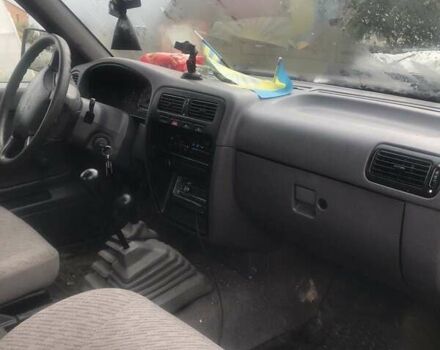 Коричневый Ниссан Навара, объемом двигателя 2.49 л и пробегом 290 тыс. км за 3786 $, фото 5 на Automoto.ua