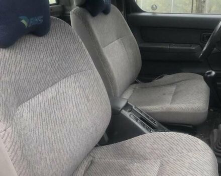 Коричневый Ниссан Навара, объемом двигателя 2.49 л и пробегом 290 тыс. км за 3786 $, фото 4 на Automoto.ua