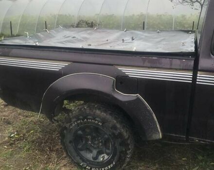 Коричневый Ниссан Навара, объемом двигателя 2.49 л и пробегом 290 тыс. км за 3786 $, фото 7 на Automoto.ua