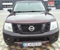 Коричневый Ниссан Навара, объемом двигателя 2.49 л и пробегом 218 тыс. км за 15000 $, фото 1 на Automoto.ua
