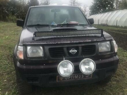 Коричневый Ниссан Навара, объемом двигателя 2.49 л и пробегом 290 тыс. км за 3786 $, фото 1 на Automoto.ua