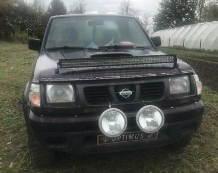 Коричневый Ниссан Навара, объемом двигателя 2.49 л и пробегом 290 тыс. км за 3786 $, фото 1 на Automoto.ua