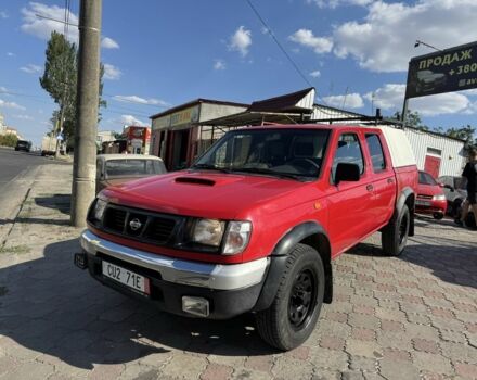 Красный Ниссан Навара, объемом двигателя 2.5 л и пробегом 250 тыс. км за 4199 $, фото 1 на Automoto.ua