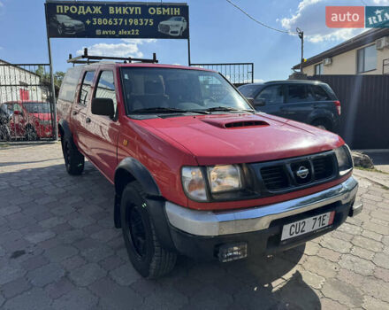 Красный Ниссан Навара, объемом двигателя 2.5 л и пробегом 250 тыс. км за 4199 $, фото 2 на Automoto.ua