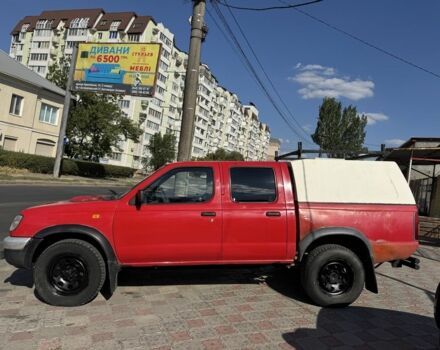 Красный Ниссан Навара, объемом двигателя 2.5 л и пробегом 250 тыс. км за 4199 $, фото 14 на Automoto.ua