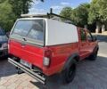 Красный Ниссан Навара, объемом двигателя 2.5 л и пробегом 250 тыс. км за 4199 $, фото 4 на Automoto.ua