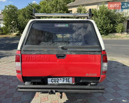 Красный Ниссан Навара, объемом двигателя 2.5 л и пробегом 250 тыс. км за 4199 $, фото 4 на Automoto.ua