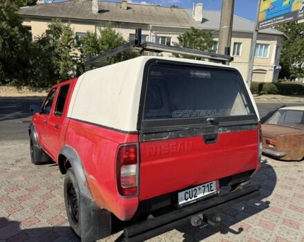 Красный Ниссан Навара, объемом двигателя 2.5 л и пробегом 250 тыс. км за 4199 $, фото 6 на Automoto.ua