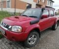 Червоний Ніссан Навара, об'ємом двигуна 2.5 л та пробігом 170 тис. км за 4822 $, фото 1 на Automoto.ua