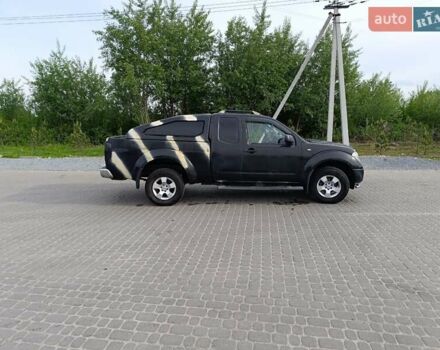 Красный Ниссан Навара, объемом двигателя 2.49 л и пробегом 295 тыс. км за 9100 $, фото 4 на Automoto.ua
