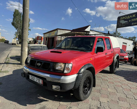 Красный Ниссан Навара, объемом двигателя 2.5 л и пробегом 250 тыс. км за 4199 $, фото 1 на Automoto.ua
