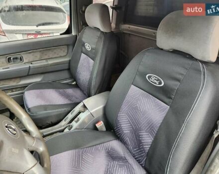 Серый Ниссан Навара, объемом двигателя 2.7 л и пробегом 240 тыс. км за 7999 $, фото 14 на Automoto.ua