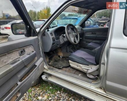 Серый Ниссан Навара, объемом двигателя 2.7 л и пробегом 240 тыс. км за 7999 $, фото 11 на Automoto.ua