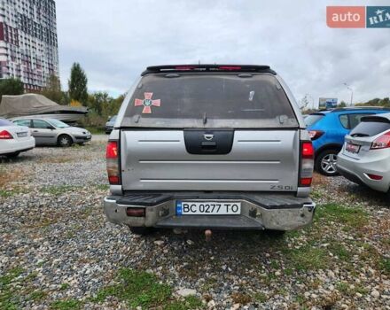 Серый Ниссан Навара, объемом двигателя 2.7 л и пробегом 240 тыс. км за 7999 $, фото 12 на Automoto.ua