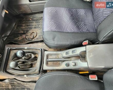 Серый Ниссан Навара, объемом двигателя 2.7 л и пробегом 240 тыс. км за 7999 $, фото 13 на Automoto.ua