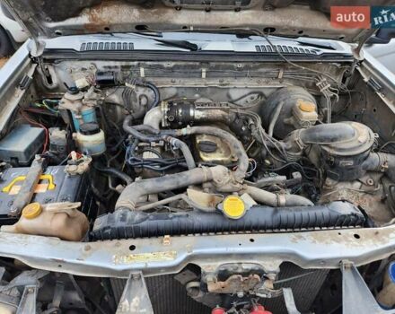 Серый Ниссан Навара, объемом двигателя 2.7 л и пробегом 240 тыс. км за 7999 $, фото 31 на Automoto.ua