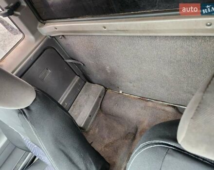 Серый Ниссан Навара, объемом двигателя 2.7 л и пробегом 240 тыс. км за 7999 $, фото 15 на Automoto.ua