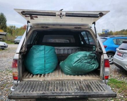 Серый Ниссан Навара, объемом двигателя 2.7 л и пробегом 240 тыс. км за 7999 $, фото 24 на Automoto.ua