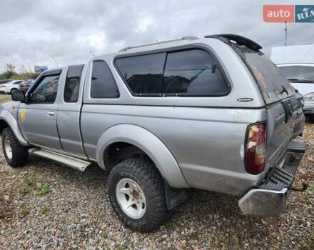 Серый Ниссан Навара, объемом двигателя 2.7 л и пробегом 240 тыс. км за 7999 $, фото 4 на Automoto.ua